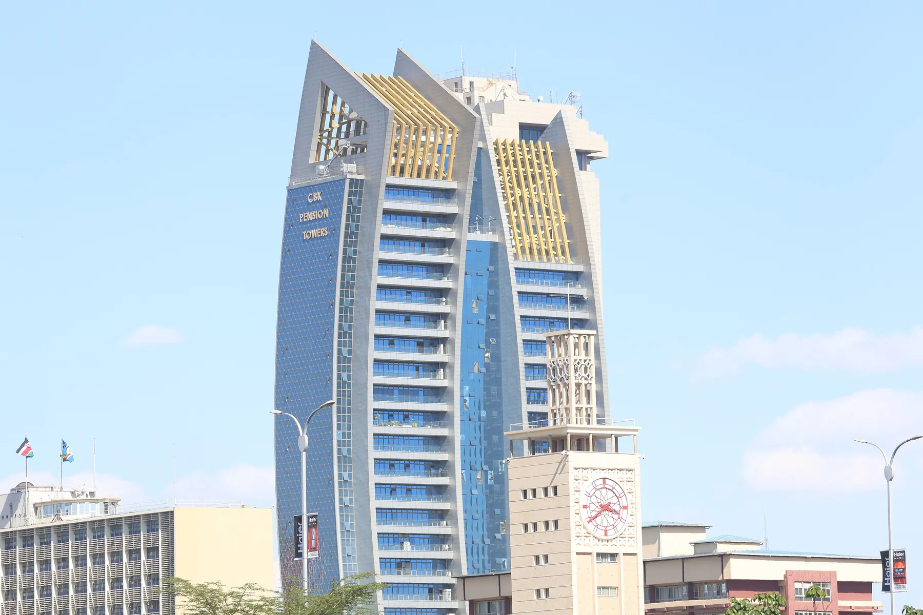 The CBK Pension Tower in central Nairobi, a glass high-rise with a tower crane at its roof